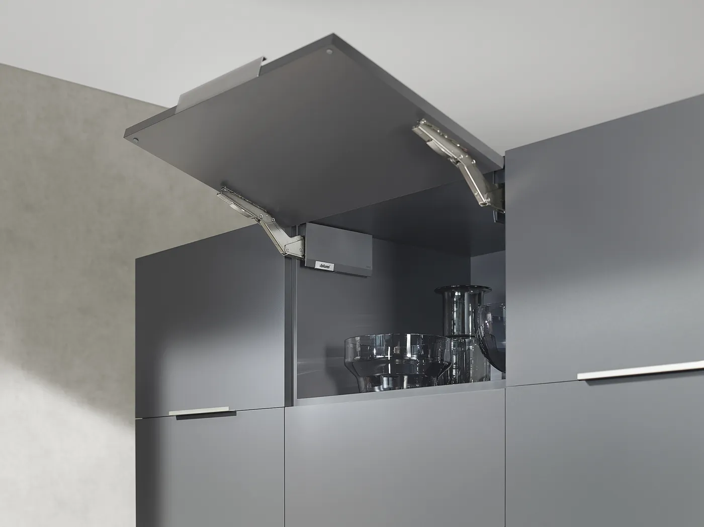 Blum lift system on a grey upper cabinet
