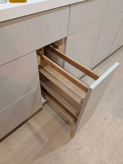 Light wood soft-close drawer interior construction detail